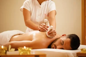 relaxed-man-enjoying-back-massage-with-herbal-compress-during-spa-treatment-2.webp relaxed-man-enjoying-back-massage-with-herbal-compress-during-spa-treatment-2.webp